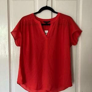 Red flowy professional top